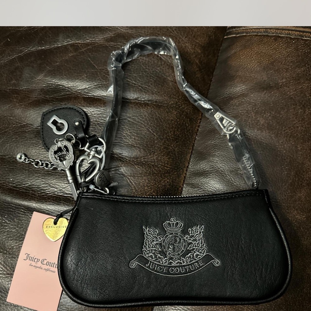 Juicy Couture Black Logo Embossed Wristlet